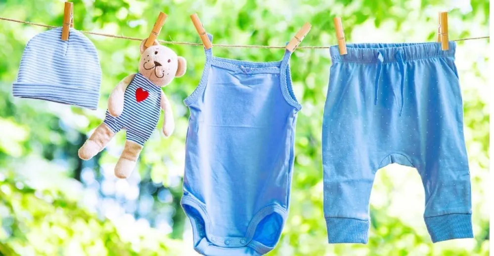 Baby clothes hanging on the clothesline outdoor picture id831896914 1